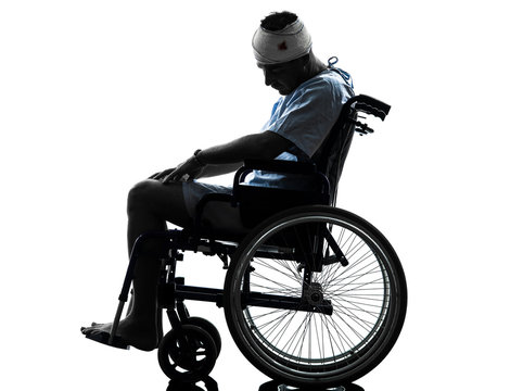 Injured Man In Wheelchair  Silhouette