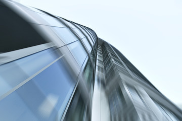 Fototapeta premium Modern glass silhouettes of building skyscrapers at night