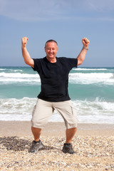 Man is happy at sea