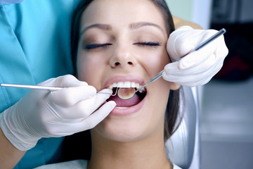Young girl at the dentist's control