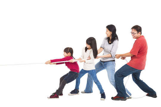 Happy Family Playing Tug Of War