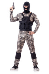 Soldier in camouflage with gun on white