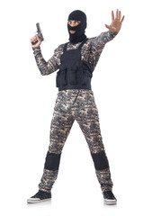 Soldier in camouflage with gun on white