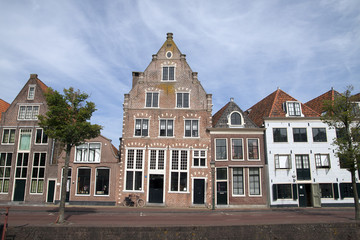 Fototapeta na wymiar Old house on the habour of the Dutch historic town