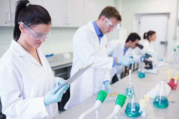 Researchers carrying out experiments in the lab