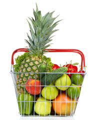 Assortment of fresh fruits and vegetables in metal basket,