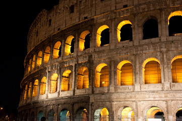 Naklejka premium The Colosseum at the night. Rome, Italy.