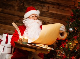 Santa Claus in wooden home interior 