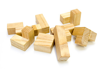 A wooden cube puzzle over white