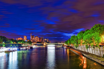 Fototapeta na wymiar City, urban view of Paris from Seine river.France