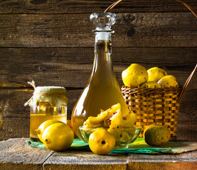 alcohol quince liqueur sliced fruit prepare wooden setting