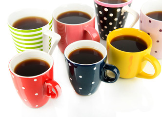 Many cups of coffee isolated on white