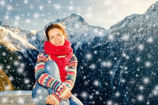 Attractive girl in snowy winter Alps