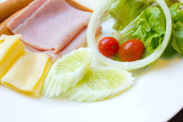 breakfast with  sausage ham , toast, salad