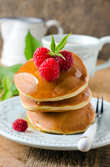 Pancakes with honey and raspberry