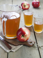 Apple juice and red apples