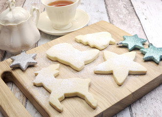 Homemade Christmas shortbread biscuit cookies with tea