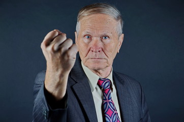 Businessman with fist ready to fight