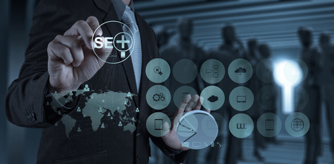businessman hand showing search engine optimization SEO