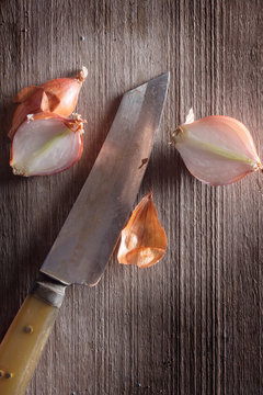 Shallot with kitchen knife