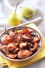 Baked pears on a folk style plate
