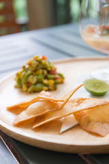 Nachos chips with salsa salad sauce