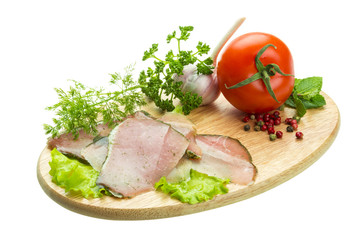 Ripe fresh ham with vegetables