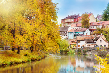 Fototapeta premium Lovely houses and autumn trees