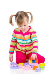 kid girl playing with toys