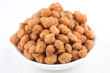 Spiced coated fried peanut.