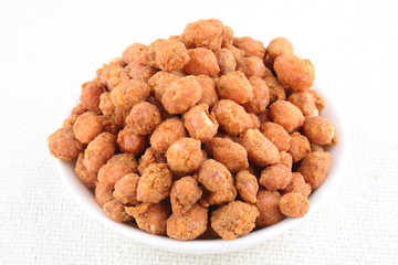 Spiced coated fried peanut.