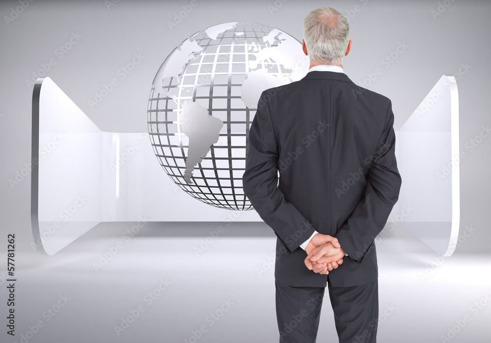 Aufkleber composite image of rear view of serious businessman posing