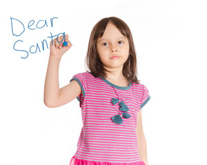 Young girl writing to Santa on imaginary board