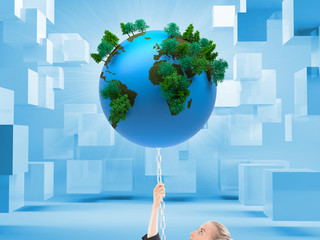 Composite image of businesswoman pulling a chain