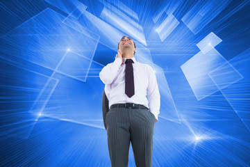 Composite image of smiling businessman standing