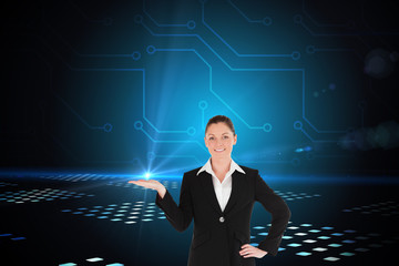 Composite image of charming woman in suit showing a copy space