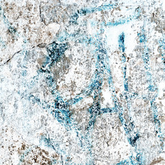 blue texture of shabby paint and plaster cracks background