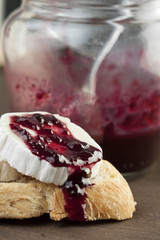 Bread with cheese and blackberry jam