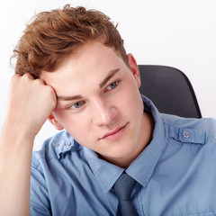 Young man while thinking