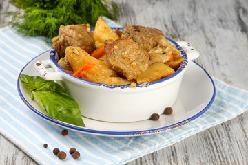 Homemade beef stir fry with vegetables in color bowl,