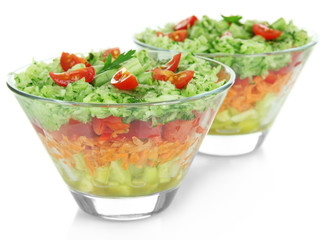 Tasty salad with fresh vegetables, isolated on white