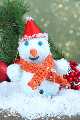 Beautiful snowman and Christmas decor, on bright background