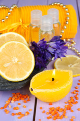 Romantic lighted candles on wooden table close up