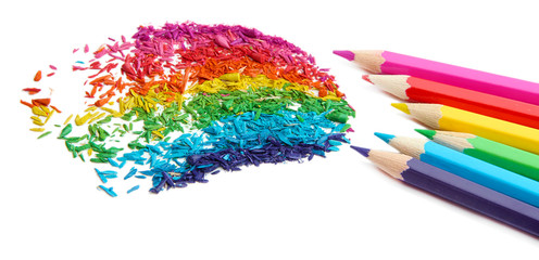 Colour pencils with sharpening shavings isolated on white