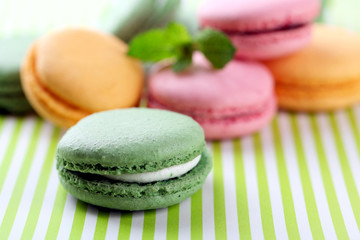 Gentle macaroons on table close-up