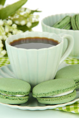 Coffee and macaroons close-up