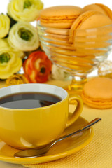 Coffee and macaroons close-up