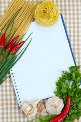 Fototapeta na wymiar Cooking concept. Groceries with empty cookbook close up