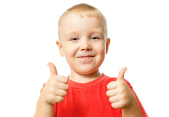 Happy boy showing thumbs up gesture