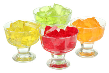 Tasty jelly cubes in bowls isolated on white
